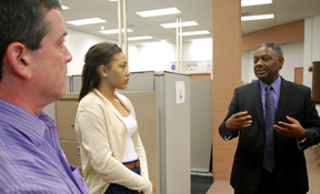 Dr. Kelvin Kirby, right, discusses microgravity team preparations with Dr. Buddy Gersey, Technical Supervisor, and Camille Smith, undergraduate co-leader.